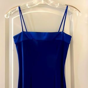 Blue formal dress with lace up back and thigh high split on one side. Worn once.